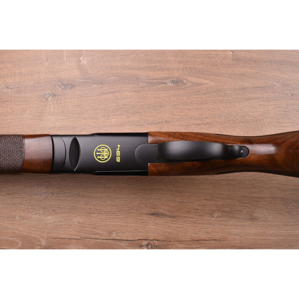 12 gauge 694 Black Dlc Sporting Adjustable 