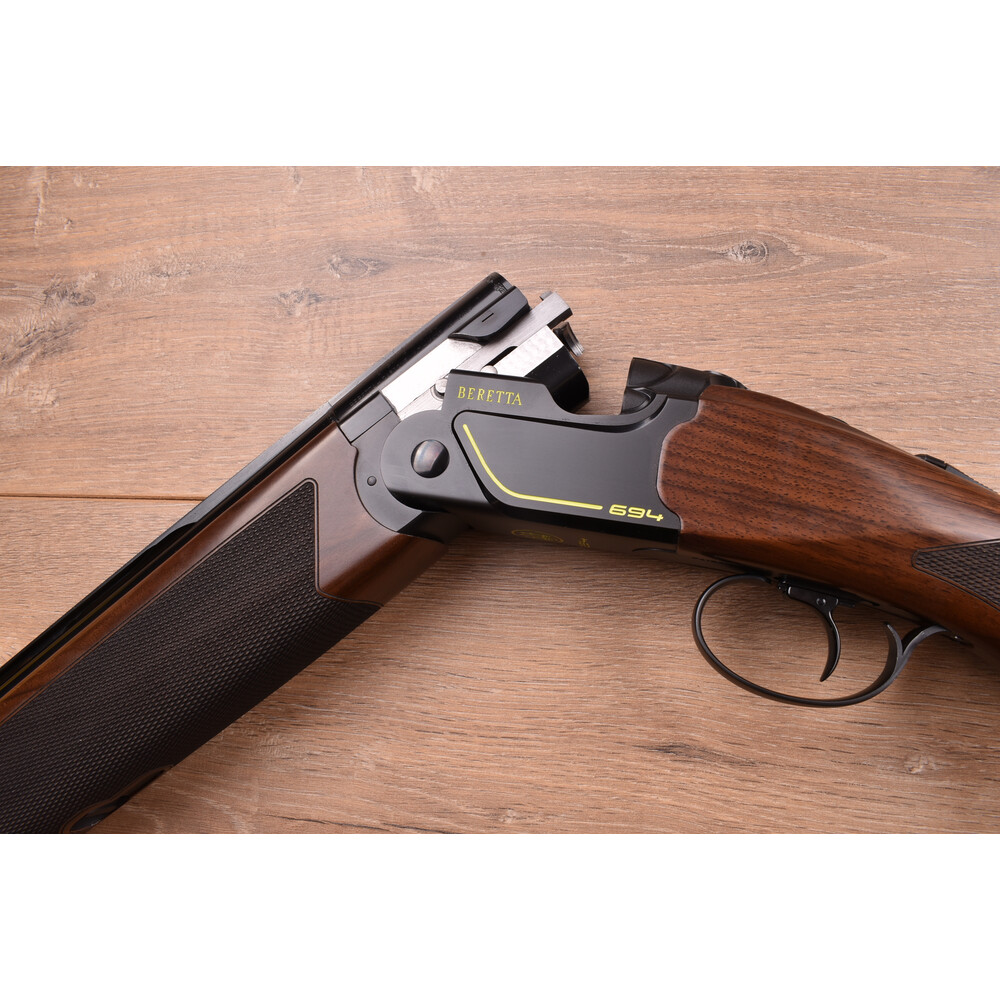 12 gauge 694 Black Dlc Sporting Adjustable 