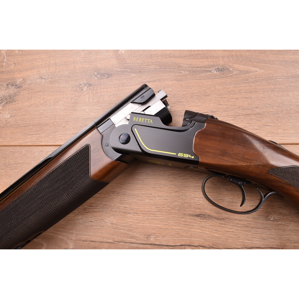 12 gauge 694 Black Dlc Adjustable Sport 